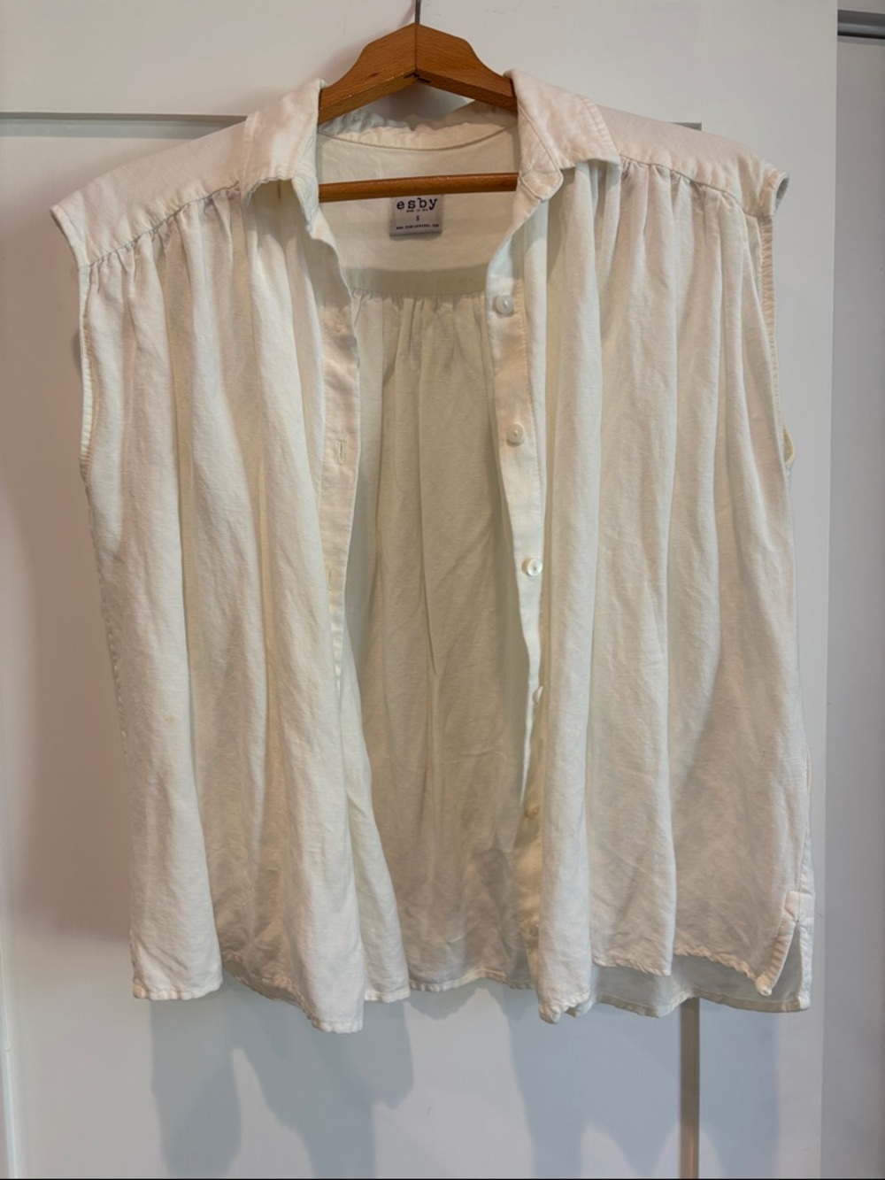 White Sleeveless Button-Front Blouse